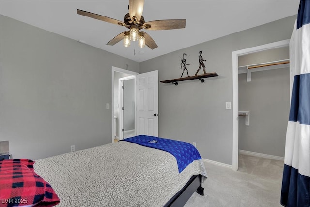 4617 Mancilla St, Las Vegas, NV 89130 - bedroom with light colored carpet, baseboards, and ceiling fan