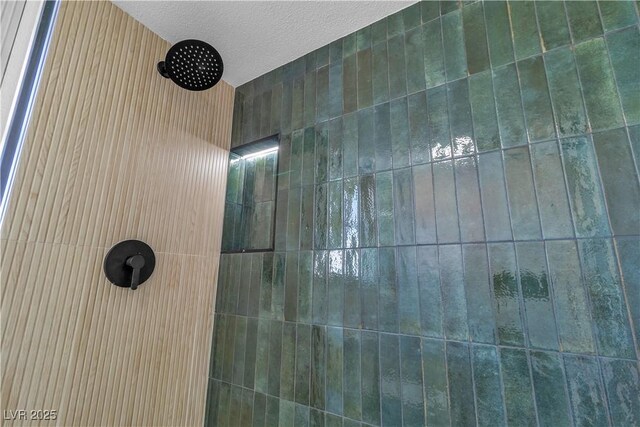 4061 W Eldorado Ln, Las Vegas, NV 89139 - bathroom view of a tile shower and a textured ceiling