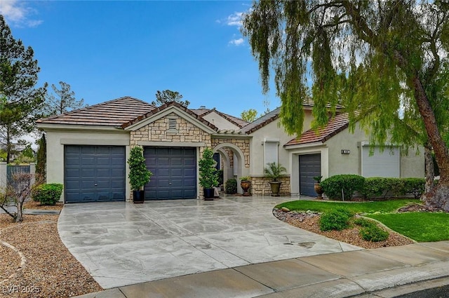 729 Sir James Bridge Way, Las Vegas, NV 89145 - view of front of home featuring a garage, stucco siding, driveway, and a tile roof