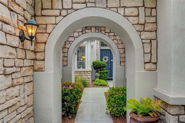 729 Sir James Bridge Way, Las Vegas, NV 89145 - property entrance featuring stone siding