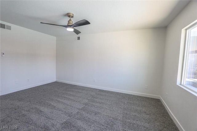 6842 Greengrove Dr, Las Vegas, NV 89103 - unfurnished room featuring dark carpet, a ceiling fan, and baseboards