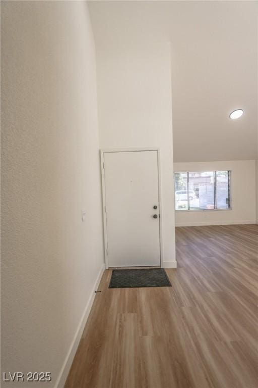 6842 Greengrove Dr, Las Vegas, NV 89103 - doorway with wood finished floors, baseboards, and recessed lighting