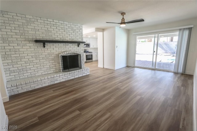 6842 Greengrove Dr, Las Vegas, NV 89103 - unfurnished living room featuring baseboards, a ceiling fan, wood finished floors, and a fireplace
