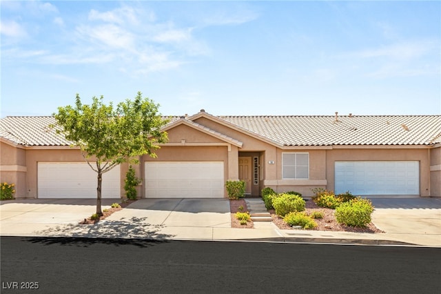 199 Bailey Island Dr, Henderson, NV 89074 - single story home featuring driveway, stucco siding, a tile roof, and an attached garage