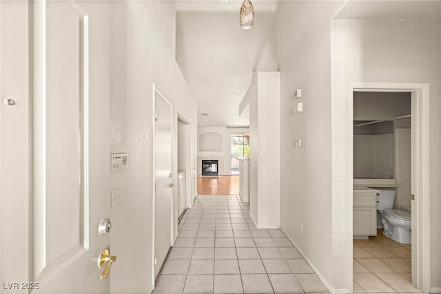 199 Bailey Island Dr, Henderson, NV 89074 - corridor featuring light tile patterned floors and baseboards
