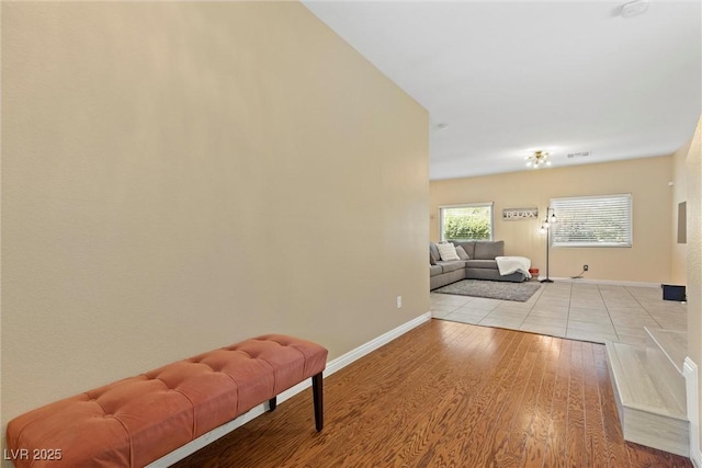 6049 Paddleboat St, North Las Vegas, NV 89031 - hall with baseboards and wood finished floors