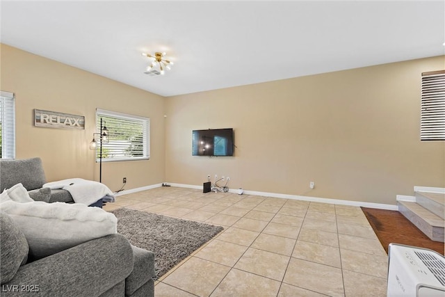 6049 Paddleboat St, North Las Vegas, NV 89031 - living room with light tile patterned floors and baseboards