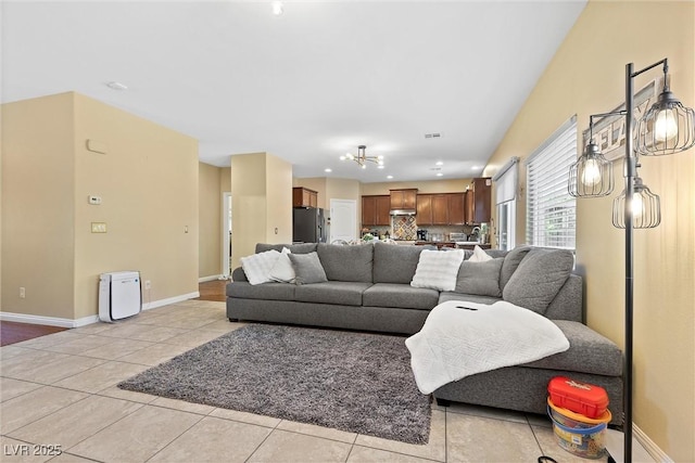 6049 Paddleboat St, North Las Vegas, NV 89031 - living area featuring light tile patterned floors, recessed lighting, and baseboards