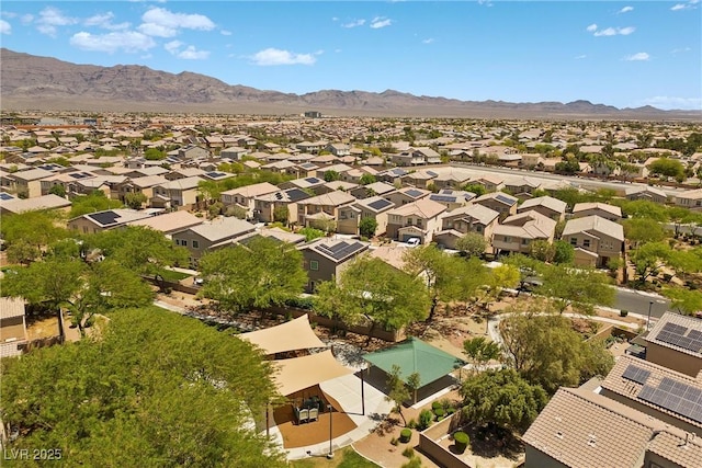 6049 Paddleboat St, North Las Vegas, NV 89031 - aerial view of residential area with a mountain backdrop