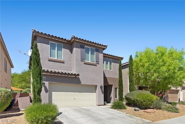 6049 Paddleboat St, North Las Vegas, NV 89031 - view of front facade featuring stucco siding, a tile roof, a garage, and concrete driveway