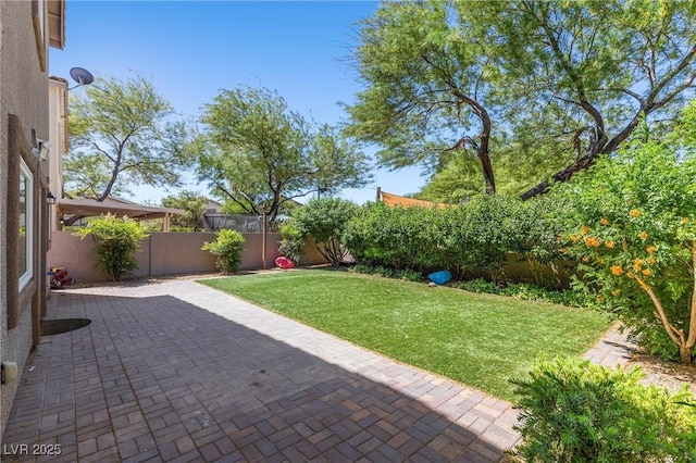 6049 Paddleboat St, North Las Vegas, NV 89031 - view of yard with a patio area
