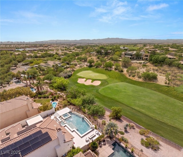 11453 Glowing Sunset Ln, Las Vegas, NV 89135 - aerial view of residential area with a pool, a mountain backdrop, and a golf course