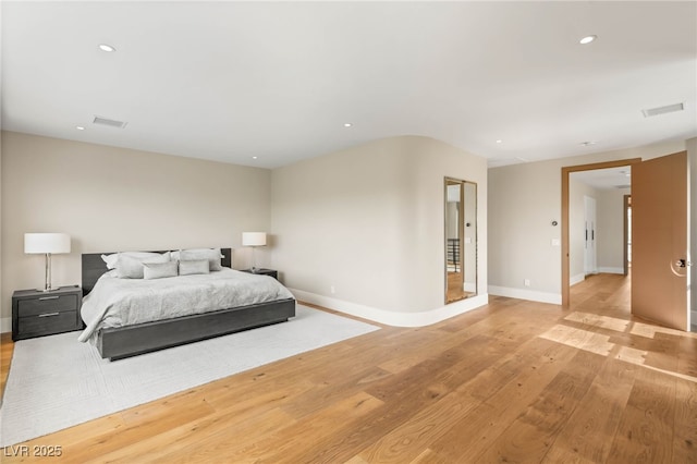 11453 Glowing Sunset Ln, Las Vegas, NV 89135 - bedroom featuring light wood finished floors, recessed lighting, and baseboards
