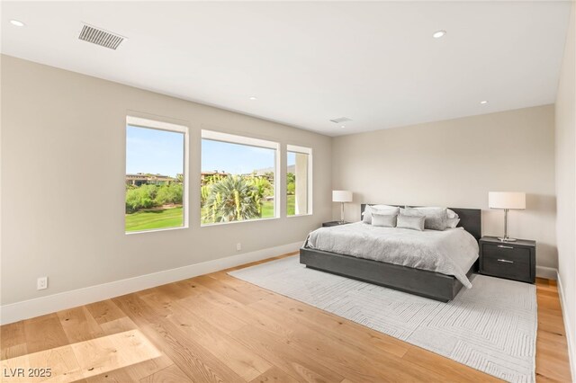 11453 Glowing Sunset Ln, Las Vegas, NV 89135 - bedroom featuring baseboards, light wood finished floors, and recessed lighting