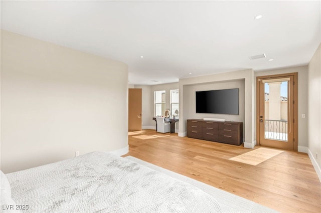 11453 Glowing Sunset Ln, Las Vegas, NV 89135 - unfurnished living room featuring light wood-style flooring, baseboards, and recessed lighting