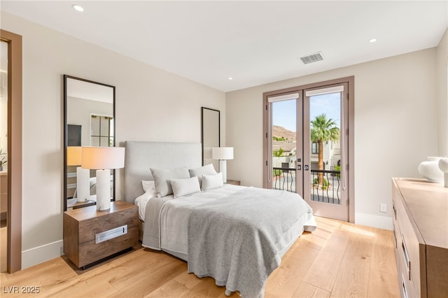 11453 Glowing Sunset Ln, Las Vegas, NV 89135 - bedroom with access to exterior, light wood-style floors, french doors, baseboards, and recessed lighting