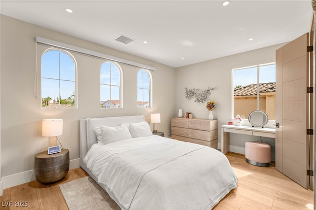 11453 Glowing Sunset Ln, Las Vegas, NV 89135 - bedroom with light wood-style floors, recessed lighting, and baseboards
