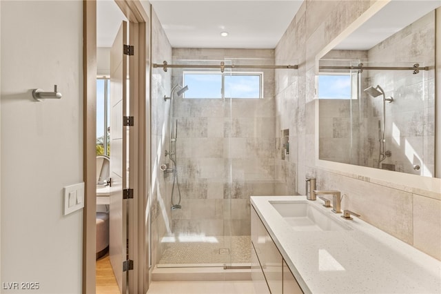 11453 Glowing Sunset Ln, Las Vegas, NV 89135 - bathroom featuring a shower stall and vanity