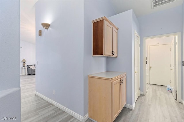 5441 Rose Hills St, Las Vegas, NV 89149 - hall with light wood-type flooring and baseboards