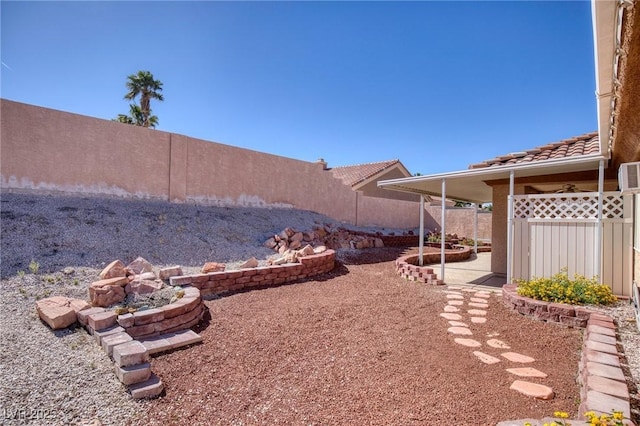 5441 Rose Hills St, Las Vegas, NV 89149 - fenced backyard with a patio