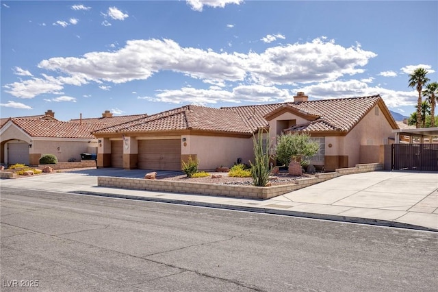 5441 Rose Hills St, Las Vegas, NV 89149 - view of front of property with a chimney, stucco siding, a tiled roof, and an attached garage