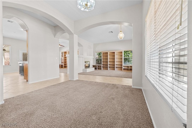 9282 W Viking Rd, Las Vegas, NV 89147 - corridor featuring carpet, tile patterned flooring, and baseboards