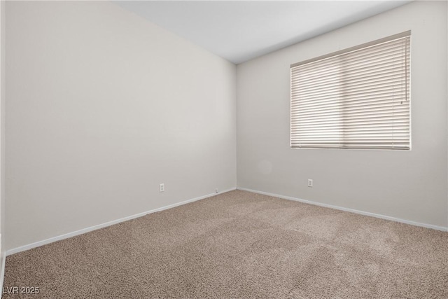 9282 W Viking Rd, Las Vegas, NV 89147 - unfurnished room featuring carpet flooring and baseboards