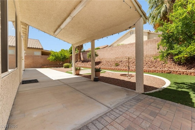 9282 W Viking Rd, Las Vegas, NV 89147 - view of patio with a fenced backyard