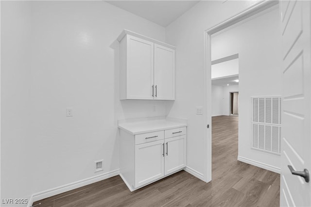 720 Webber Park St, Henderson, NV 89011 - corridor featuring wood finished floors and baseboards