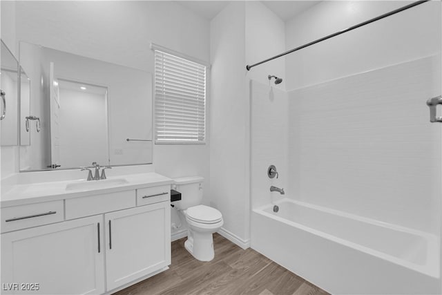 720 Webber Park St, Henderson, NV 89011 - full bath featuring wood finished floors, toilet, vanity, and bathing tub / shower combination