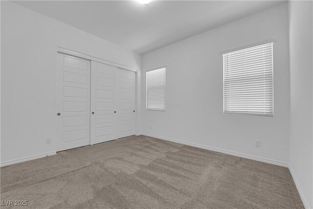 720 Webber Park St, Henderson, NV 89011 - unfurnished bedroom featuring carpet flooring, a closet, and baseboards