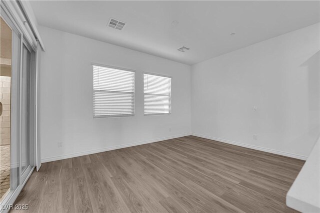 720 Webber Park St, Henderson, NV 89011 - spare room with wood finished floors and baseboards