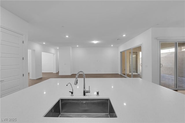 720 Webber Park St, Henderson, NV 89011 - kitchen with a sink, open floor plan, light countertops, and recessed lighting