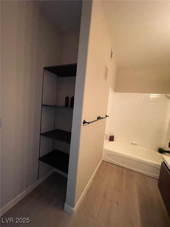 2151 Hussium Hills St Unit 207, Las Vegas, NV 89108 - bathroom with wood finished floors and baseboards