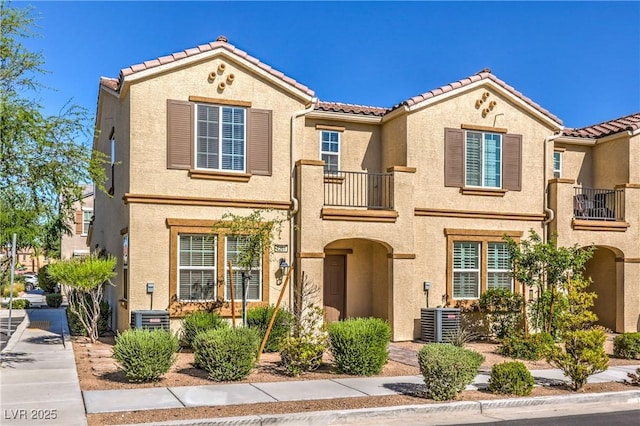 1201 Seaboard Ct, Henderson, NV 89002 - view of property with a balcony, stucco siding, and a tile roof