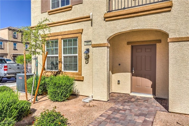 1201 Seaboard Ct, Henderson, NV 89002 - entrance to property with stucco siding and central AC unit