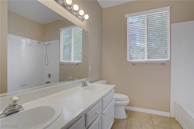 bathroom featuring tile patterned floors, toilet, shower / washtub combination, double vanity, and baseboards