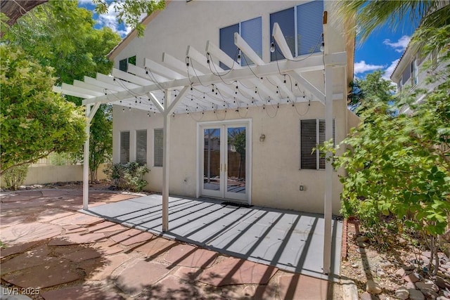 view of patio / terrace with a pergola and fence