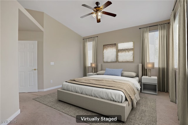 1812 Relate Ct, Las Vegas, NV 89117 - bedroom with light carpet, vaulted ceiling, baseboards, and a ceiling fan