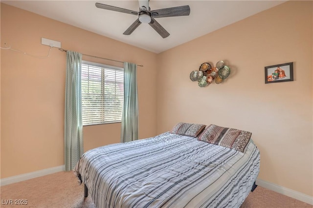 bedroom with carpet floors, baseboards, and ceiling fan