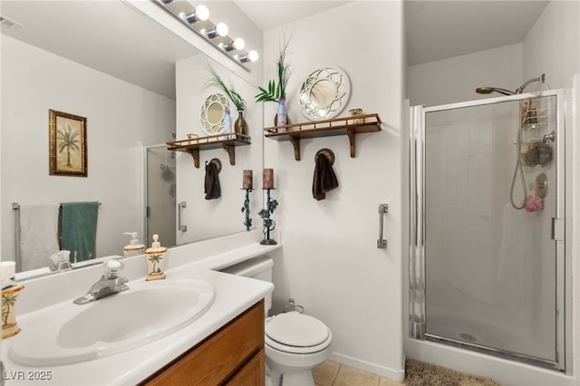 9522 Arrowhead Falls Ct, Las Vegas, NV 89148 - bathroom with a stall shower, tile patterned flooring, vanity, and toilet