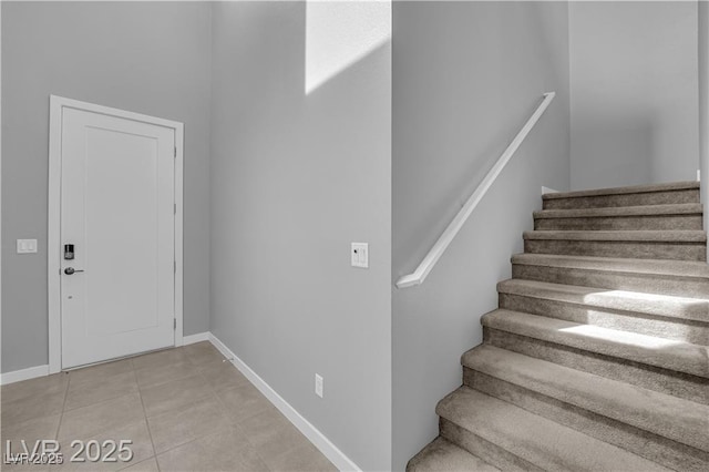 3192 Timorasso Ave, Henderson, NV 89044 - stairway with tile patterned floors and baseboards