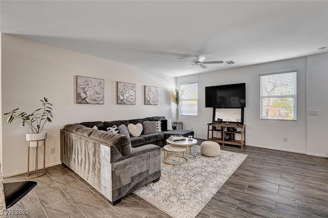 8164 Golden Cholla Ave, Las Vegas, NV 89179 - living room featuring ceiling fan and baseboards