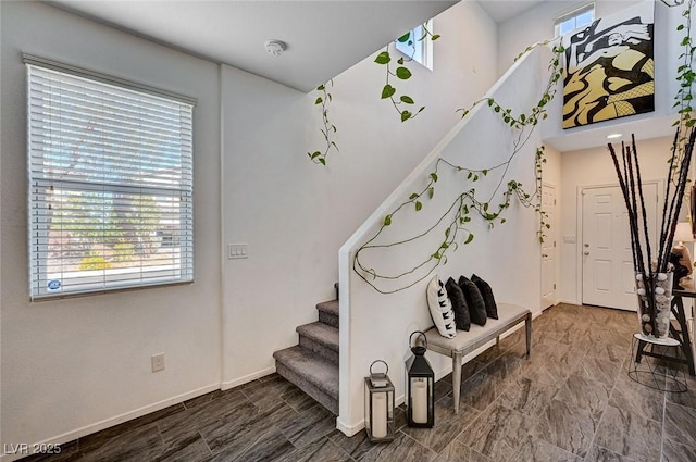 8164 Golden Cholla Ave, Las Vegas, NV 89179 - stairway with plenty of natural light and baseboards