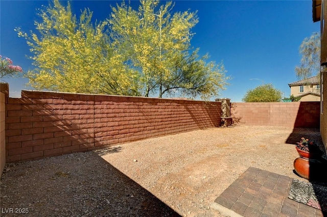 8164 Golden Cholla Ave, Las Vegas, NV 89179 - fenced backyard featuring a patio