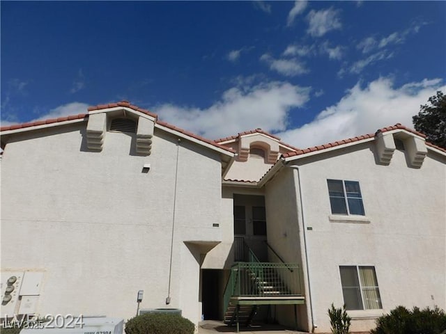 6201 E Lake Mead Blvd Unit 218, Las Vegas, NV 89156 - view of building exterior with central AC unit