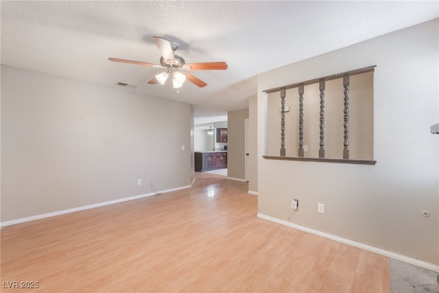 1729 Yellow Rose St, Las Vegas, NV 89108 - spare room featuring a ceiling fan, wood finished floors, and baseboards
