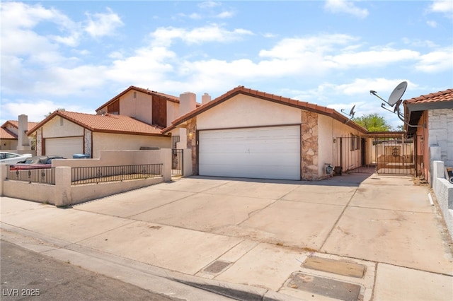 1729 Yellow Rose St, Las Vegas, NV 89108 - mediterranean / spanish house featuring a garage, a fenced front yard, stucco siding, a gate, and concrete driveway