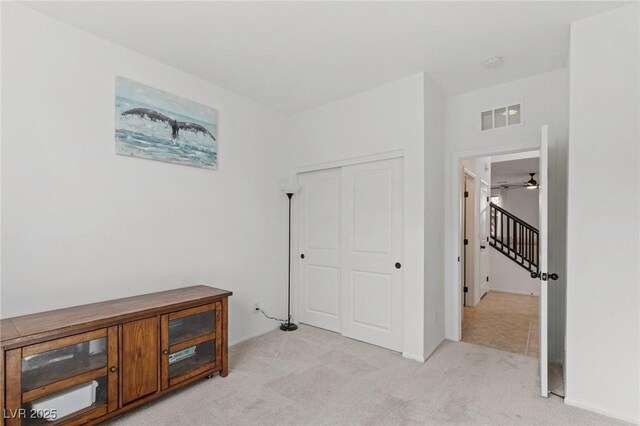 10376 Sadie Blake Ave, Las Vegas, NV 89166 - bedroom with light colored carpet and a closet