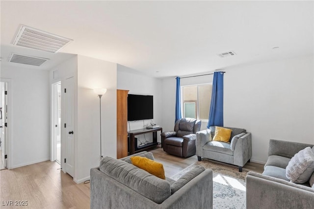 10376 Sadie Blake Ave, Las Vegas, NV 89166 - living area featuring light wood finished floors and baseboards